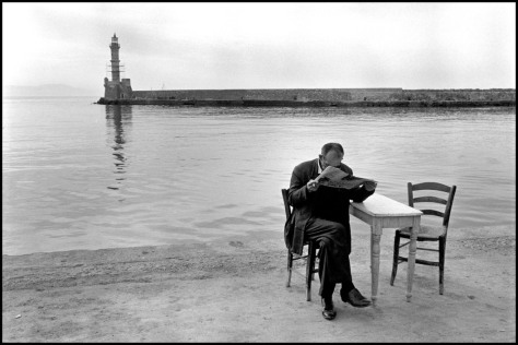 Crete. Chania. 1967. Man reading newspaper. "A Greek Portfolio" p.87